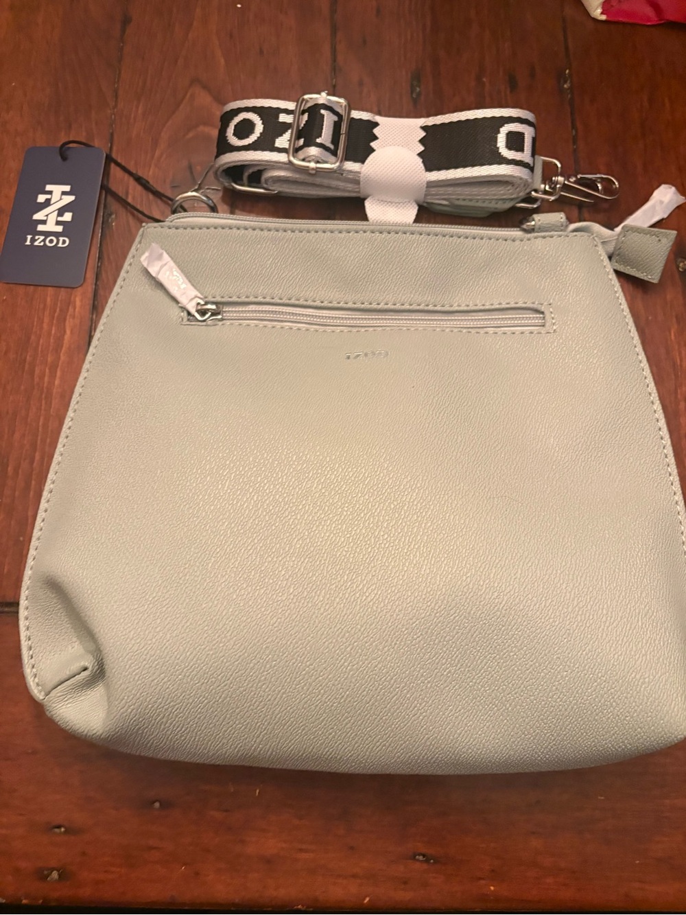 Izod Light Gray Pebbled Crossbody Bag with Branded Strap